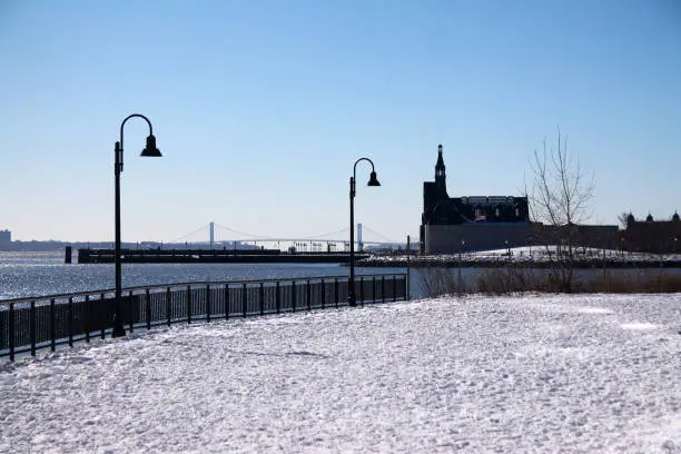 Photo of The Central Railroad of New Jersey Terminal and Verrazzano bridge with the snow