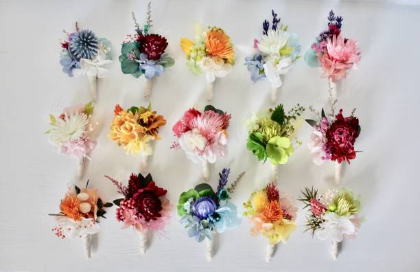 Colourful buttonholes Buttonholes made with preserved and dried flowers buttonhole flower stock pictures, royalty-free photos & images