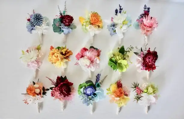 Buttonholes made with preserved and dried flowers