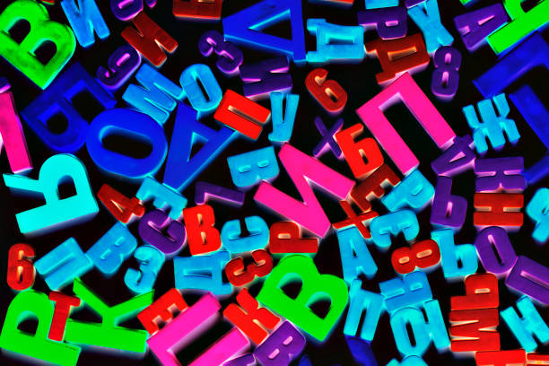 istock Colorful alphabet letters on a magnet on black 1368444202