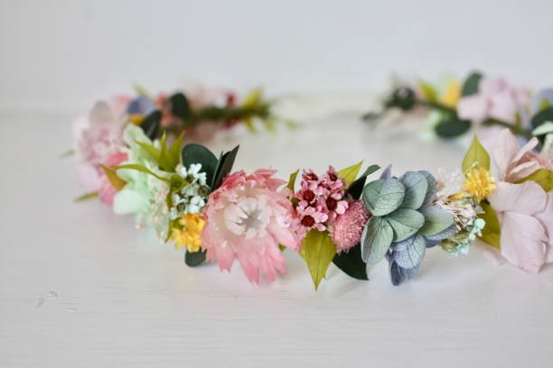 Pastel rainbow flower crown Preserved and dried flower crown for a flower girl floral crown photos stock pictures, royalty-free photos & images