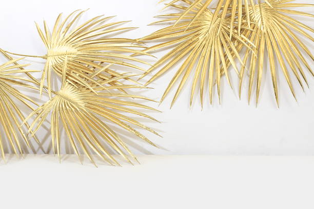 istock Empty showcase for display or presentation of cosmetic products, scene for design, abstract background with golden palm leaves and shadows 1368448191