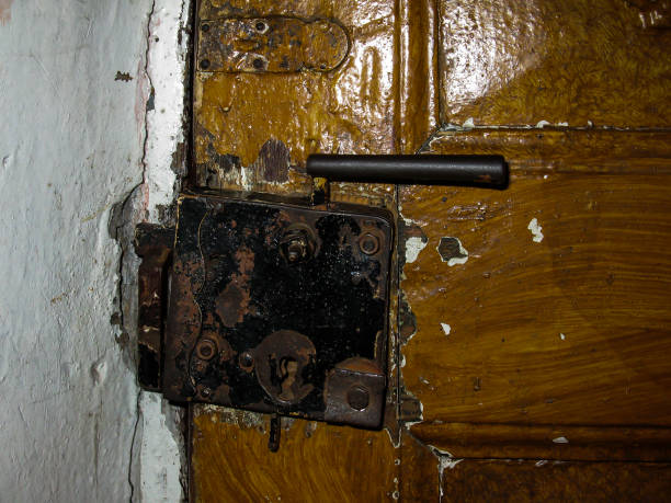 istock old, metal door lock 1368453530