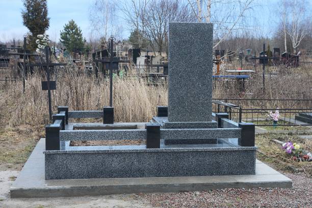 istock one large gray marble gravestone with a black stone decorative fence 1368454506