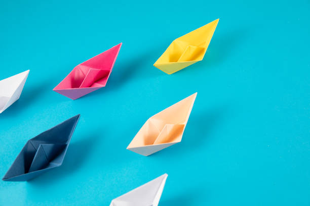 istock Leadership Concept with Paper Boats 1368454819