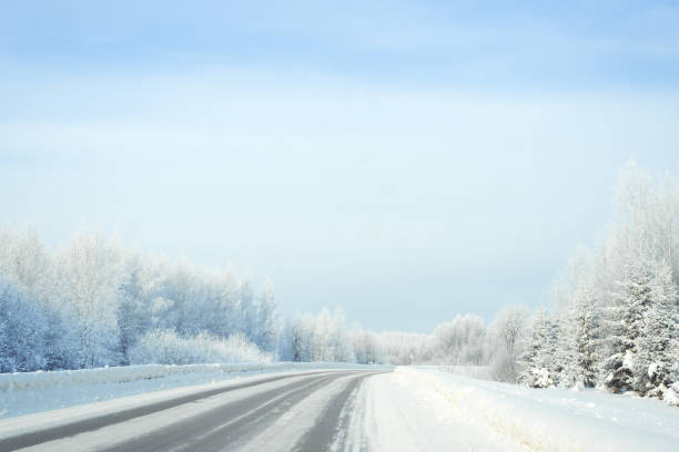 beautiful nature winter season, countryside road covered under snow