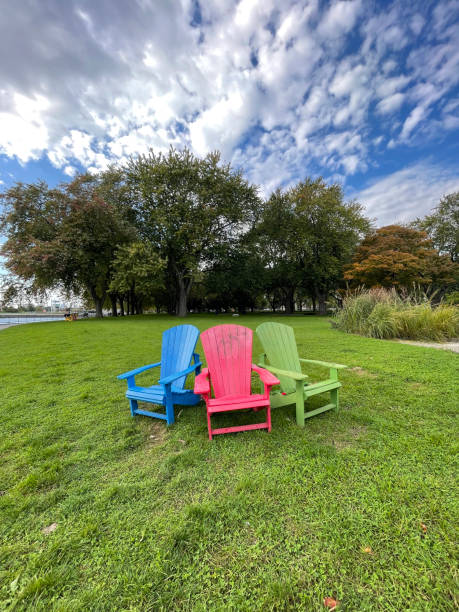 istock Three chairs in a park of Toronto 1368456945