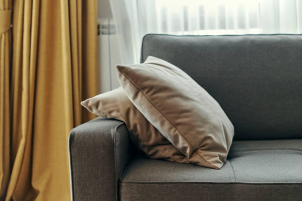 istock Cushions on the sofa in living room 1368458107