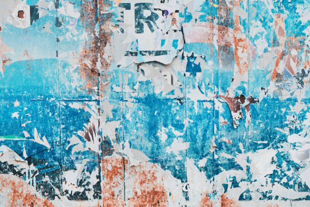 istock Torn ripped poster paper surface as abstract grunge background 1368458212