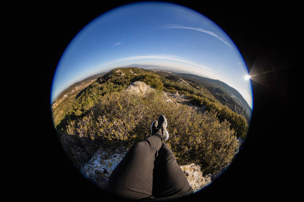 Plowing on a top company with a fisheye lens as in the background Oreokastro and Thessaloniki can be seen with Thermaikos gulf and Mount Chortiatis