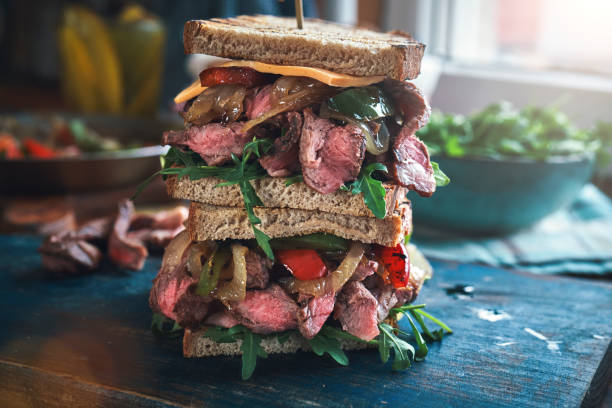 istock Double Steak Sandwich with Roasted Bell Pepper and Arugula 1368458932