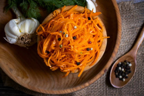 istock korean carrots on wooden background 1368460234
