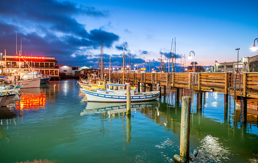 San Francisco, California - August 6, 2017: Boats in Fishermans Wharf at night