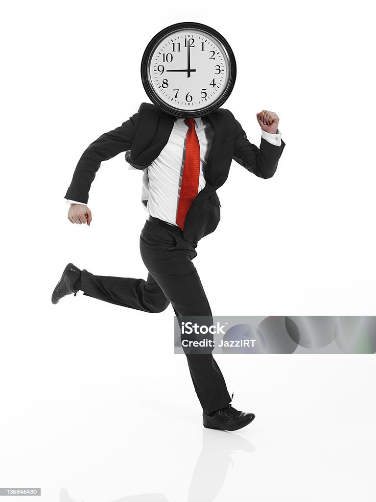 Empresário segurando o relógio na frente de sua cabeça - Royalty-free Adulto Foto de stock