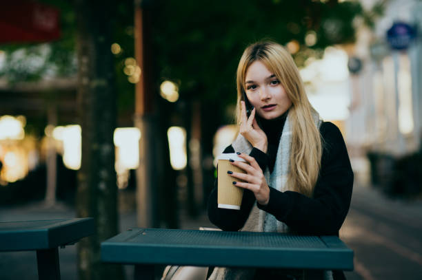 istock Young woman using the phone 1368465902