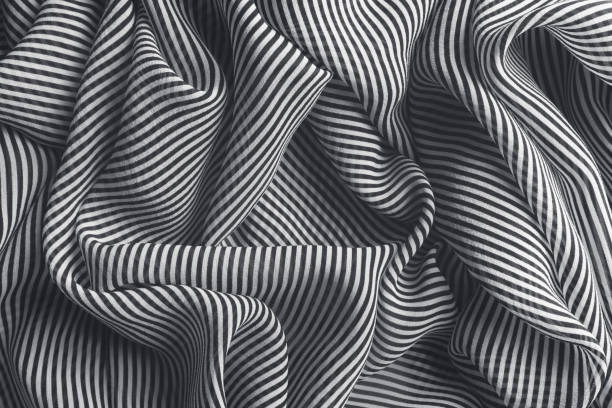 istock Striped pattern satin silk, elegant fabric for backgrounds 1368466282