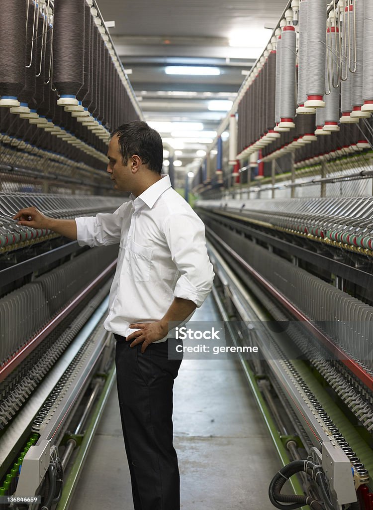 Geschäftsmann In der Spinning Factory - Lizenzfrei Herumwirbeln Stock-Foto