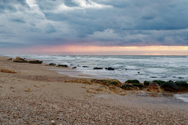 istock Beautiful sunset view from Argaman beach in Netanya 1368466951
