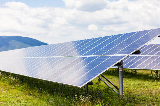 istock Solar panel photo close up on blue sky background, renewable energy eco 1368472685