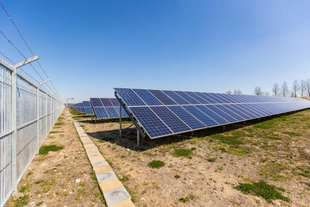 istock Solar panel photo close up on blue sky background, renewable energy eco 1368472729
