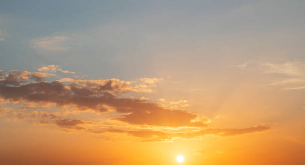 istock Fantastic bright clouds in the sunset sky. Sky background. 1368474466