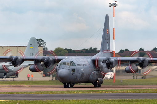 Gloucestershire, UK - July 9, 2014: Turkish Air Force Lockheed C-130E Hercules military transport aircraft 63-3187 taxiing at Fairford.