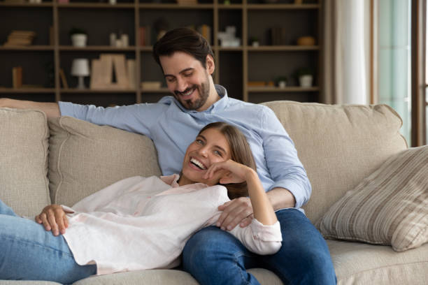 istock Happy young married enjoying leisure at home 1368476675