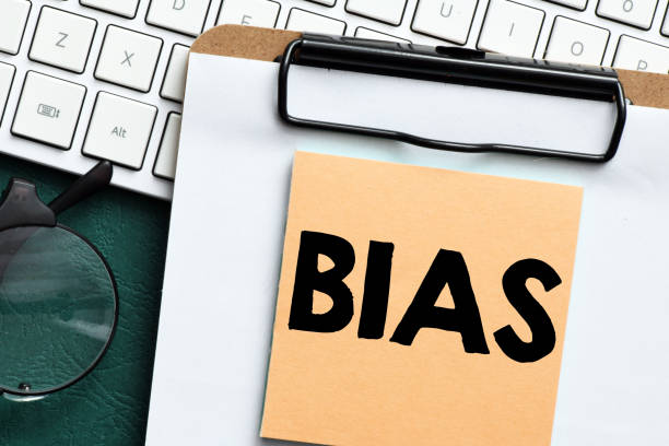 istock BIAS word on a small sheet of paper. 1368478440