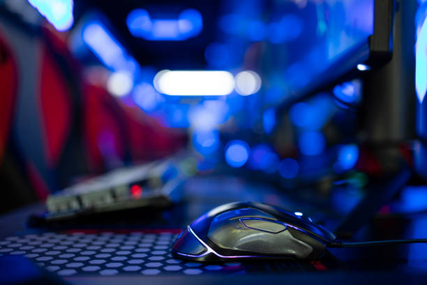 istock Close up view of computer mouse in video game room. Entertaining industry. 1368479046