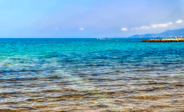 istock Stone made island as protective barrier against waves. 1368479745
