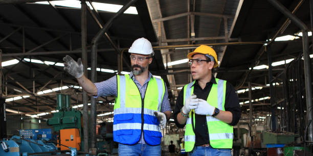 istock engineer team  full skill quality for maintenance and training  in industry factory worker , warehouse Workshop for factory operators, mechanical engineering team production. 1368480668