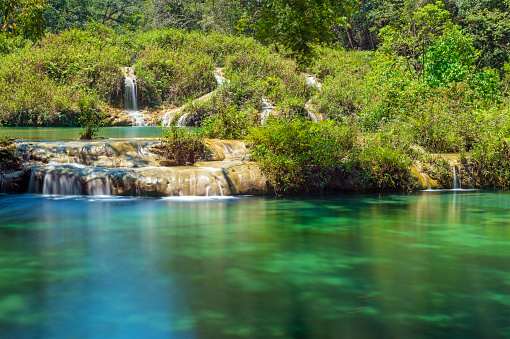 Semuc Champey cascades along the Cahabon river with long exposure, Peten rainforest, Lanquin, Guatemala.
