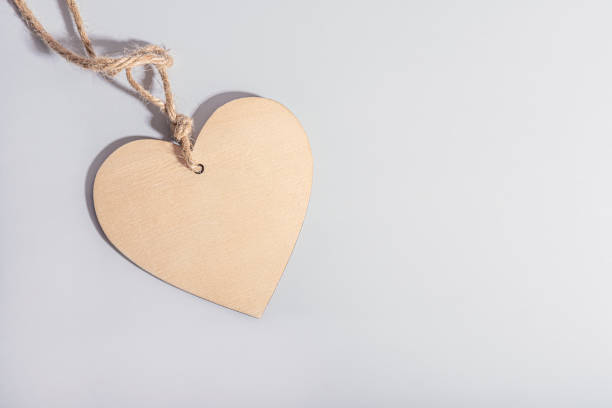 istock Wooden heart on gray background 1368483358