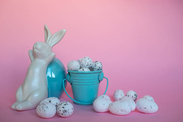 istock Easter bunny and a bucket of eggs 1368488185