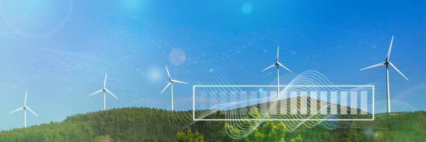 istock Wind turbines with digital visualization of wind and battery charge against a blue sky background. The concept of green renewable energy 1368489829