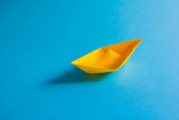 istock Yellow paper boat isolated 1368490047