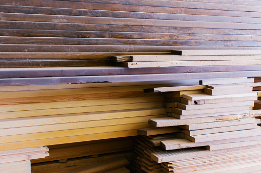 Woodworking. Furniture manufacture. Carpentry workshop. Furniture assembly. The boards are stacked. Sawmill. Wood processing. Woodworking production.