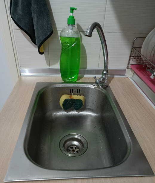 istock Sink with sponge and dishwashing liquid 1368490707