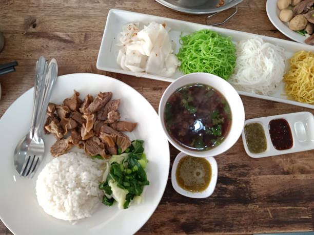 istock Thai food rice. on a wooden table, top view 1368490714