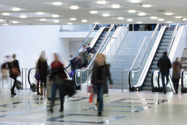 istock Large Group of People Walking Indoors, Social Issues 1368491153