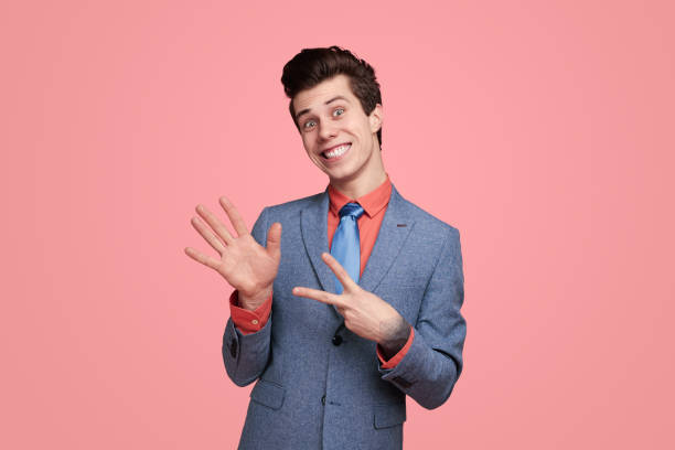 istock Comic businessman showing number seven with fingers 1368491529
