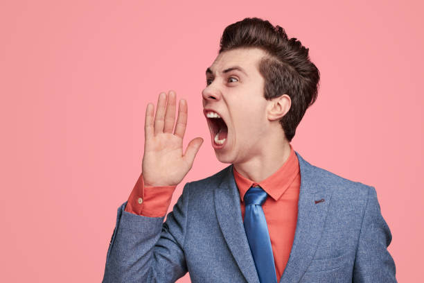 istock Comic businessman announcing news and screaming loudly 1368491538