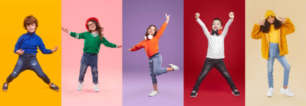 istock Joyful diverse little girls and boys having fun in studio 1368491568
