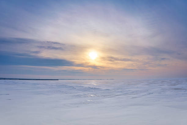istock Sunrise on iced over bay 1368492584