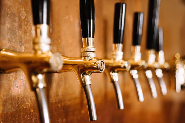 istock beer tap many in a row bar interior copper wall 1368494322