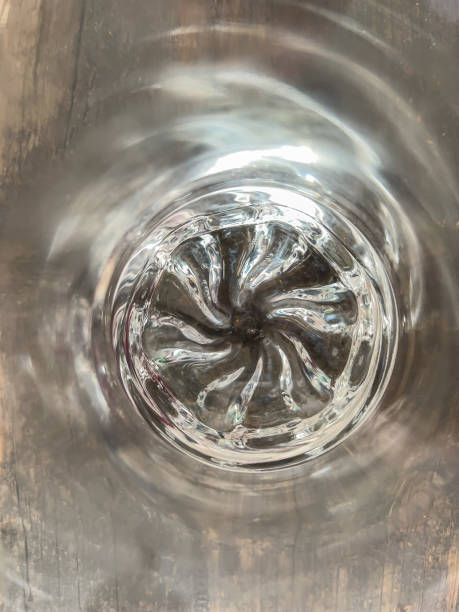 View into a glass with some water.