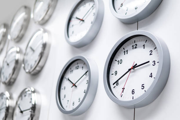 istock round white wall clocks displayed on the wall 1368495250