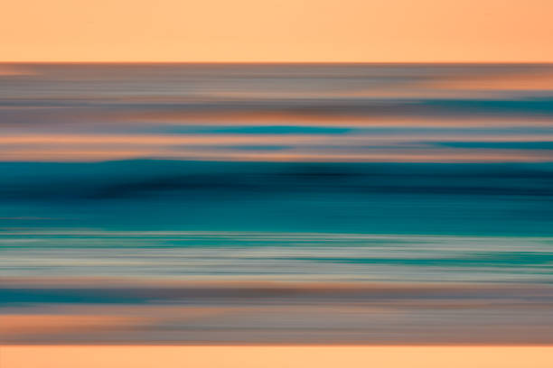 istock Abstract seascape with blurred panning motion. Sunset over the sea. Tranquil scene, multicolored, copy space 1368495629
