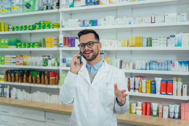 istock Portrait of a handsome pharmacist working in a pharmacy 1368498138