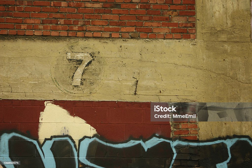 Seven Seven, lucky number on a wall of an old factory. Graffiti Stock Photo